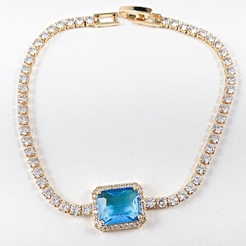 Beautiful center rectangle aquamarine cz tennis gold tone brass bracelet
