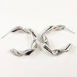 Nice twisted shiny metallic design hoop steel earrings