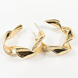 Nice twisted shiny metallic design gold tone hoop steel earrings